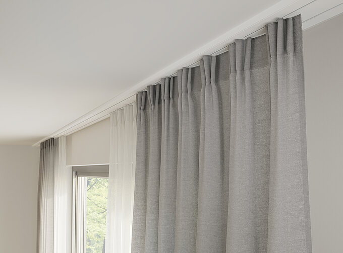 MHZ “Zet S” curtain track with double-layer fabric combination “Helios 3274” and “Selene 3311”, ceiling-mounted.