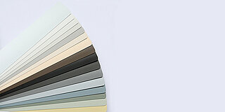 Colour fan with OBSCURE collection slats in cool greys, greens and beige. Rough surface texture with concrete effect.