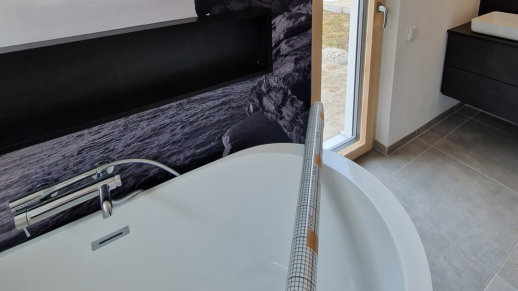 Hafttextil der Kooperation im Badezimmer