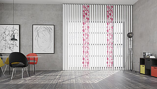 Interior with white vertical blinds and individual slats featuring a pink circular pattern in front of large windows