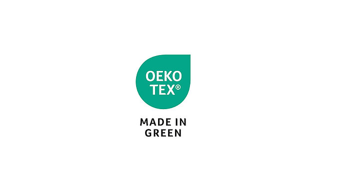 OEKO-TEX® MADE IN GREEN label in green drop shape with white lettering.